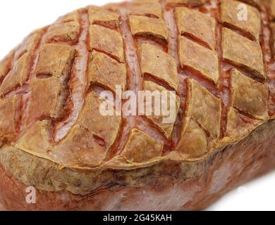 close up of fresh german leberkaese crust, typical bavarian meat loaf as background Stock Photo
