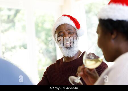 Multi generation african american family drinking wine Stock Photo