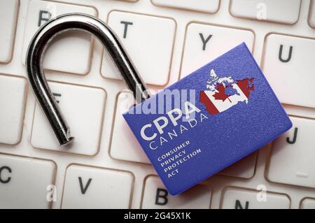 Canada new data protection law (cppa) concept: an open lock over a computer keyboard with the text CPPA Canada consumer privacy protection act Stock Photo