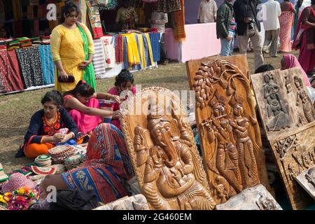 Stalls selling traditional wooden crafts in Poush Mela, a historical rural fair of about 127 years old at Shantiniketan, West Bengal, India. Stock Photo