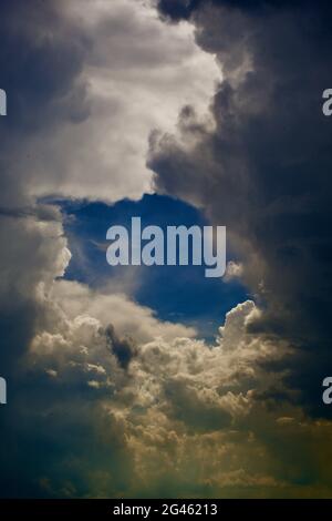 Blue hole in the clouds Stock Photo