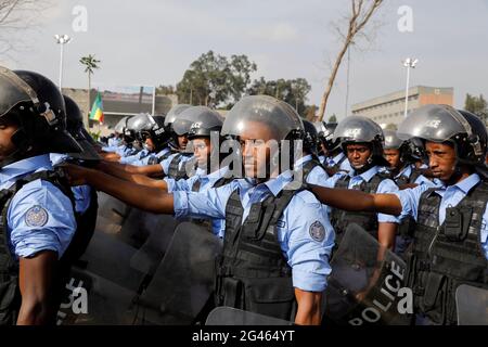 Addis Ababa police officers dressed in riot gear, take part in a parade ...