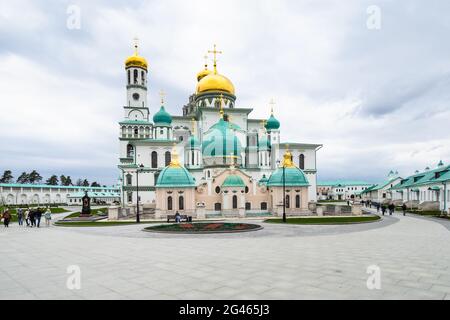 Istra, Moscow Region, Russia - May 6, 2021: view of the Resurrection cathedral and churches of New Jerusalem Monastery from gateway on cloudy day. The Stock Photo