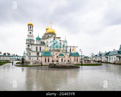 Istra, Moscow Region, Russia - May 6, 2021: view of courtyard of New Jerusalem Monastery with church of Sts Constantine and Helena and Resurrection Ca Stock Photo