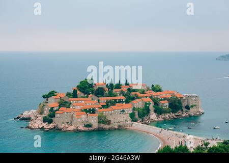 Island of Sveti Stefan, close-up of the island in the afternoon. Stock Photo