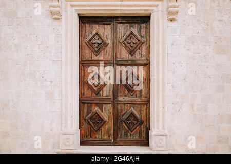 Old yellow, brown, red doors. Wood texture Stock Photo