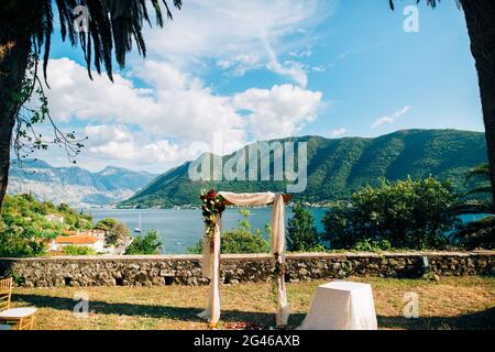 Wedding Arch on the beach. Wooden arch for the wedding ceremony Stock Photo