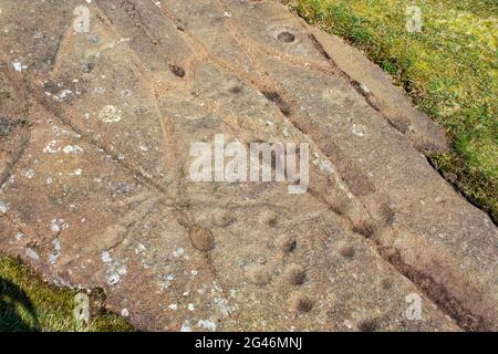 Cup and ring marked stones at Cairnbaan in Argyll, Scotland Stock Photo