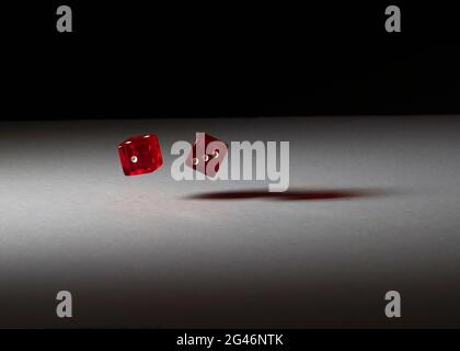Rolling dice Stock Photo