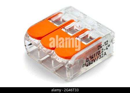 3-terminal splicing connector for stranded and solid wires for electric cables, isolated on white background. Stock Photo