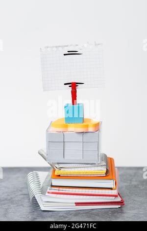 Organized Stack Note Pad, Bundle Notebooks, Neat Pile Documents, Pleasant Arrangement Writing Materials, Clean Workspace, Office Stock Photo