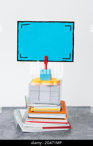 Organized Stack Note Pad, Bundle Notebooks, Neat Pile Documents, Pleasant Arrangement Writing Materials, Clean Workspace, Office Stock Photo