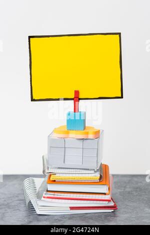 Organized Stack Note Pad, Bundle Notebooks, Neat Pile Documents, Pleasant Arrangement Writing Materials, Clean Workspace, Office Stock Photo