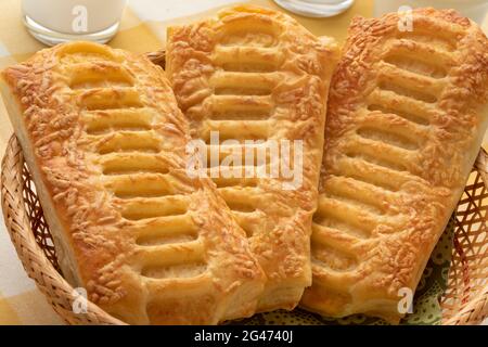 Crispy cheese puff pastry snack for lunch close up in a basket Stock Photo