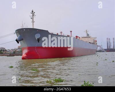 a cargo ship in a harbor of cochin , Kerala ,India Stock Photo