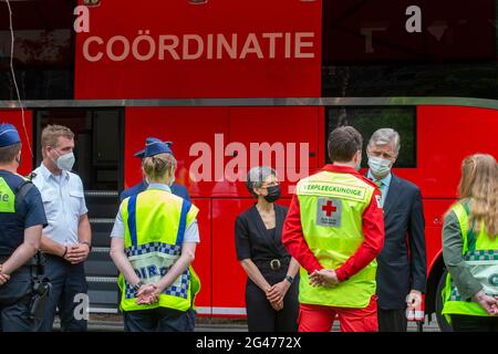 King Philippe - Filip of Belgium meets the rescue workers at the site of a collapsed building at a construction site in the Jos Smolderenstraat in the Stock Photo