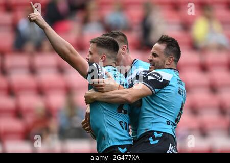 Connor Wynne (23) of Hull FC celebrates his try Stock Photo