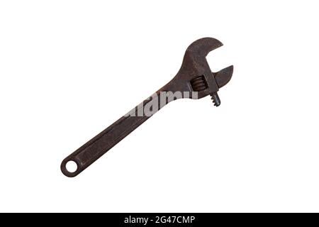 Old rusty adjustable wrench isolated on a white background. Work concept. Stock Photo