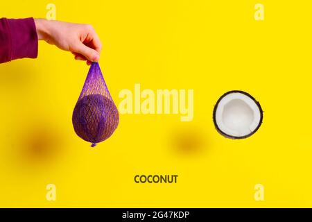 simple minimalistic raw cracked coconut raw nuts isolated top view Stock Photo