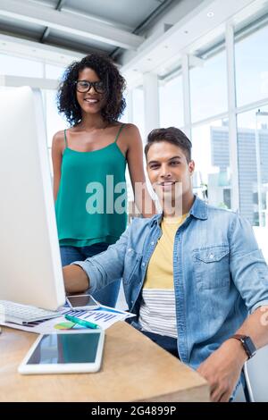 Executives working on computer in the office Stock Photo