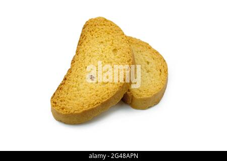 Two sweet croutons with raisins on a white plate. Loaf crackers. Sweet Dry crackers, close-up Stock Photo