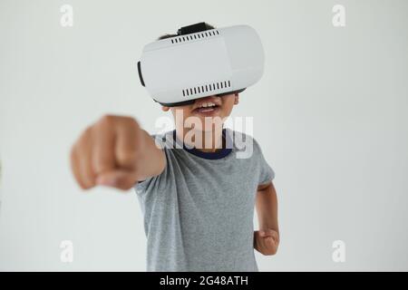 Schoolboy using virtual reality headset Stock Photo
