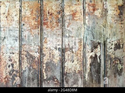 Vertical slats of heavily weathered wood Stock Photo