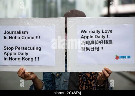 London, UK. 19th June, 2021. A placard in support of Apple daily during the demonstration. Hong Kong's national security police arrested the chief editor and four executives of the pro-democracy newspaper on Jun 17, 2021 in Hong Kong raiding its newsroom for a second time in the latest blow to the outspoken tabloid. A protest in support of Apple Daily newspaper was staged outside China Embassy in London. Credit: SOPA Images Limited/Alamy Live News Stock Photo