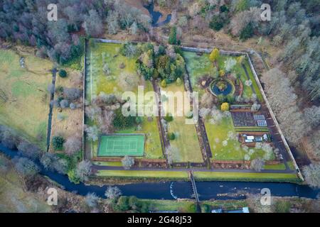 Victorian old walled garden and tennis court in private grounds Stock Photo