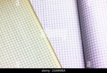 Blank notebook pages background flatly. Opened notepad notebook with a checkered sheets. Vintage looking blank sheet in a cage from the school noteboo Stock Photo