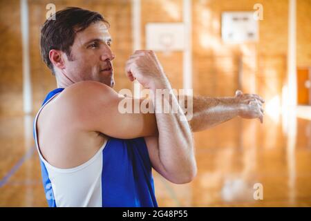 Close up of man exercising in court Stock Photo