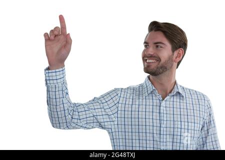 Man pretending to touch an invisible screen Stock Photo