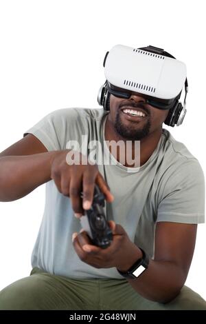 Man using virtual reality headset and playing video game Stock Photo