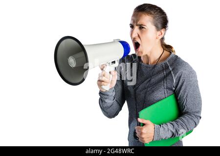 Female rugby coach shouting on megaphone Stock Photo