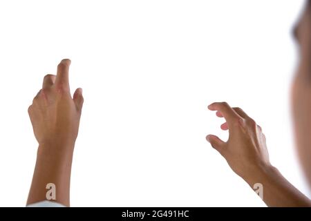 Man pretending to touch an invisible screen Stock Photo