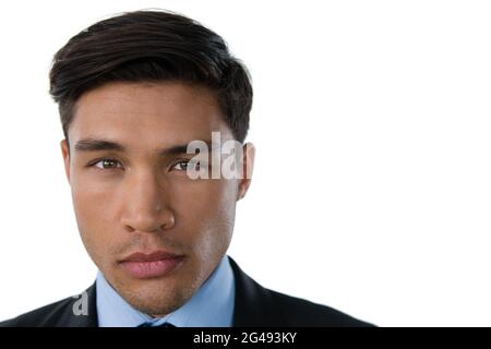 Portrait of businessman with raised eyebrow Stock Photo