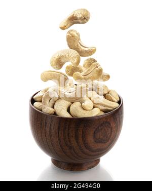 Falling cashew nuts isolated on white background Stock Photo