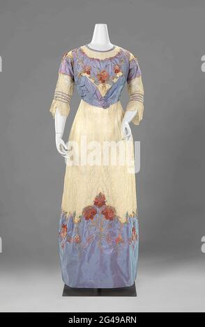 Gown (fourreau). Thanks to the designer Paul Poiret tubular dresses became  fashionable from 1906. In French this slender silhouette is called  fourreau, or sheath. The purple taffeta divides this dress into three