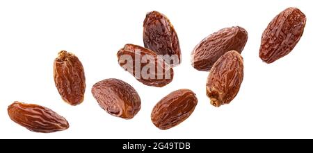Falling dried dates isolated on white background Stock Photo