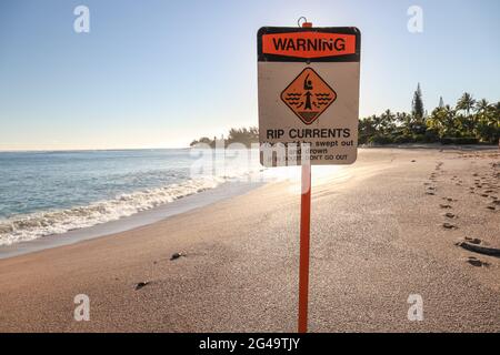 Beach safety warning sign informs visitors about dangerous shorebreak ...