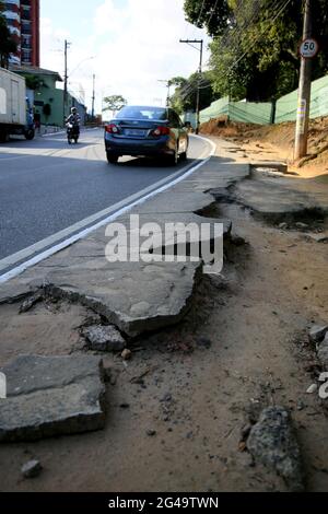 salvador, bahia, brazil - june 18, 2021: deanified sidewalk causing risk of accident for pedestrians in the city of Salvador. *** Local Caption *** Stock Photo