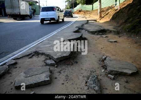 salvador, bahia, brazil - june 18, 2021: deanified sidewalk causing risk of accident for pedestrians in the city of Salvador. *** Local Caption *** Stock Photo