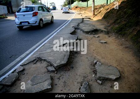 salvador, bahia, brazil - june 18, 2021: deanified sidewalk causing risk of accident for pedestrians in the city of Salvador. *** Local Caption *** Stock Photo