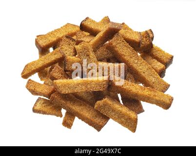 Pile of rye bread croutons, salted bread sticks isolated on white background Stock Photo