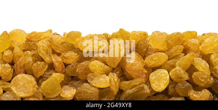 Pile of yellow raisins isolated on white background Stock Photo