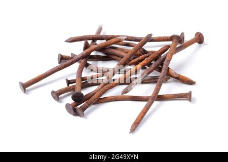 Old bent rusty nails isolated on white background Stock Photo
