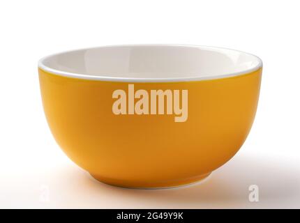 Empty yellow bowl isolated on white background Stock Photo