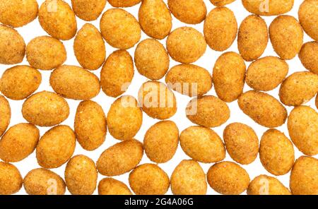 Coated peanuts isolated on white background, top view Stock Photo