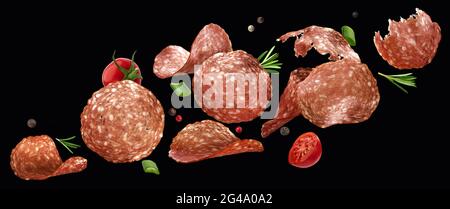 Falling sliced salami isolated on black background Stock Photo