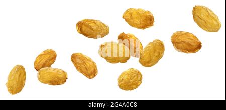 Falling yellow raisins isolated on white background Stock Photo